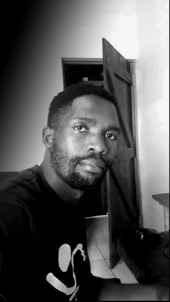 Jane leaning against a bus